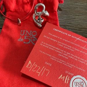 Uno de 50 retired key wrap silver ring